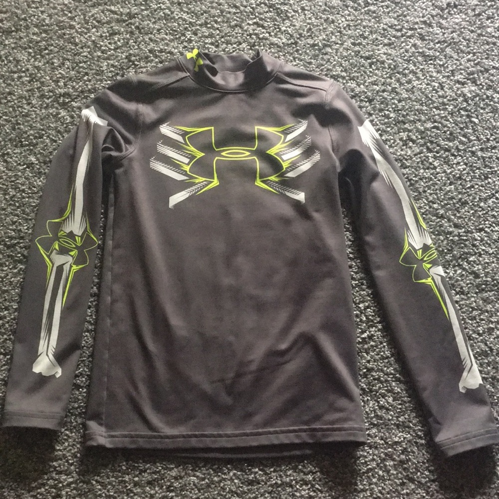 Boy Small fitted Under Armour shirt.